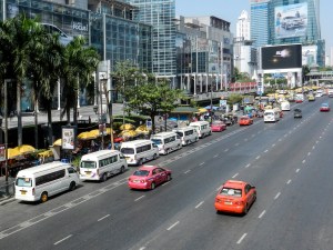 Crossing a main street in Bangkok