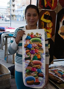 Artist with a painting I purchased at the Otavalo market