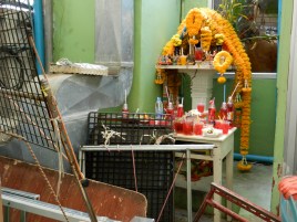 Small shrine in street market