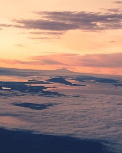 Sunrise above Vancouver's clouds