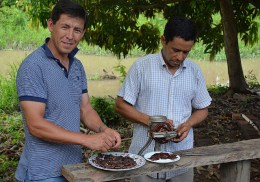 Marco, our driver, peeling cocoa beans