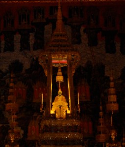 Buddha at the Grand Palace. The umbrella above the Buddha's head directs spirits upward to "heaven."