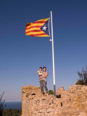 Catalan flag flying oon top of the castle