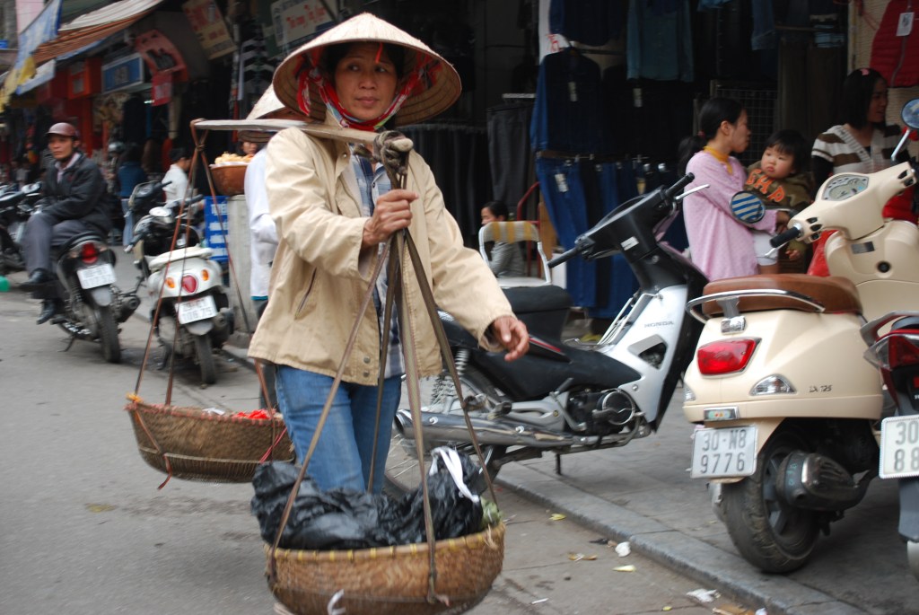 Woman carrying vegetables