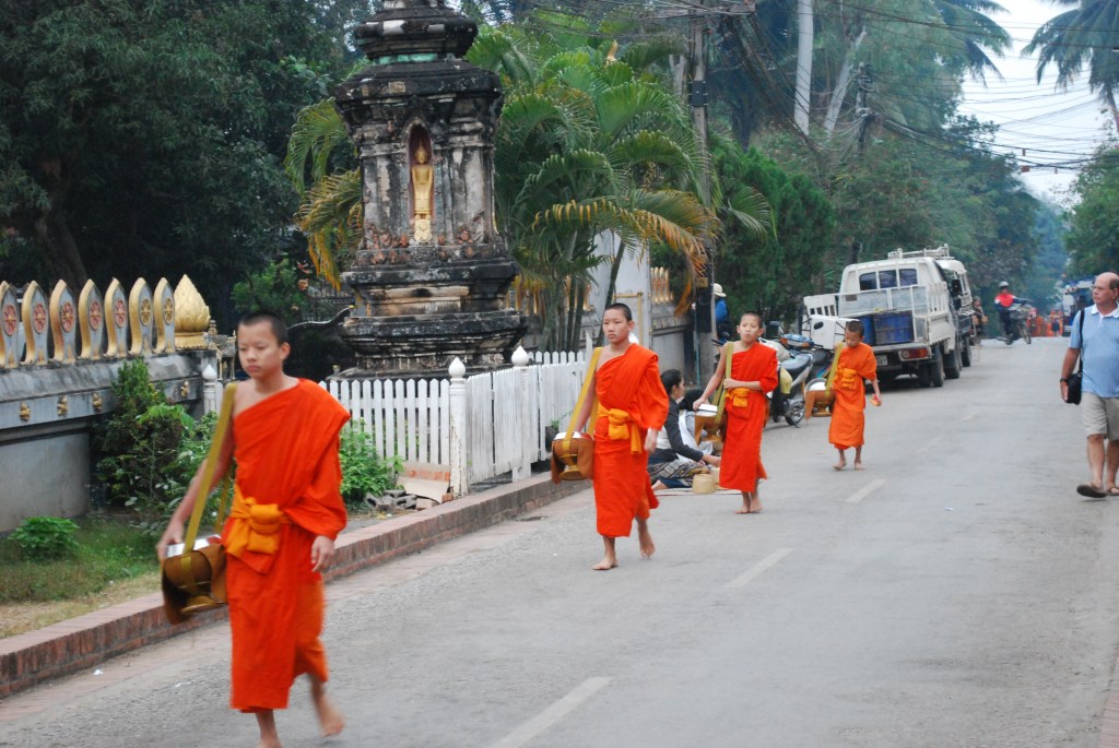 Young novice monks, shoulder bared