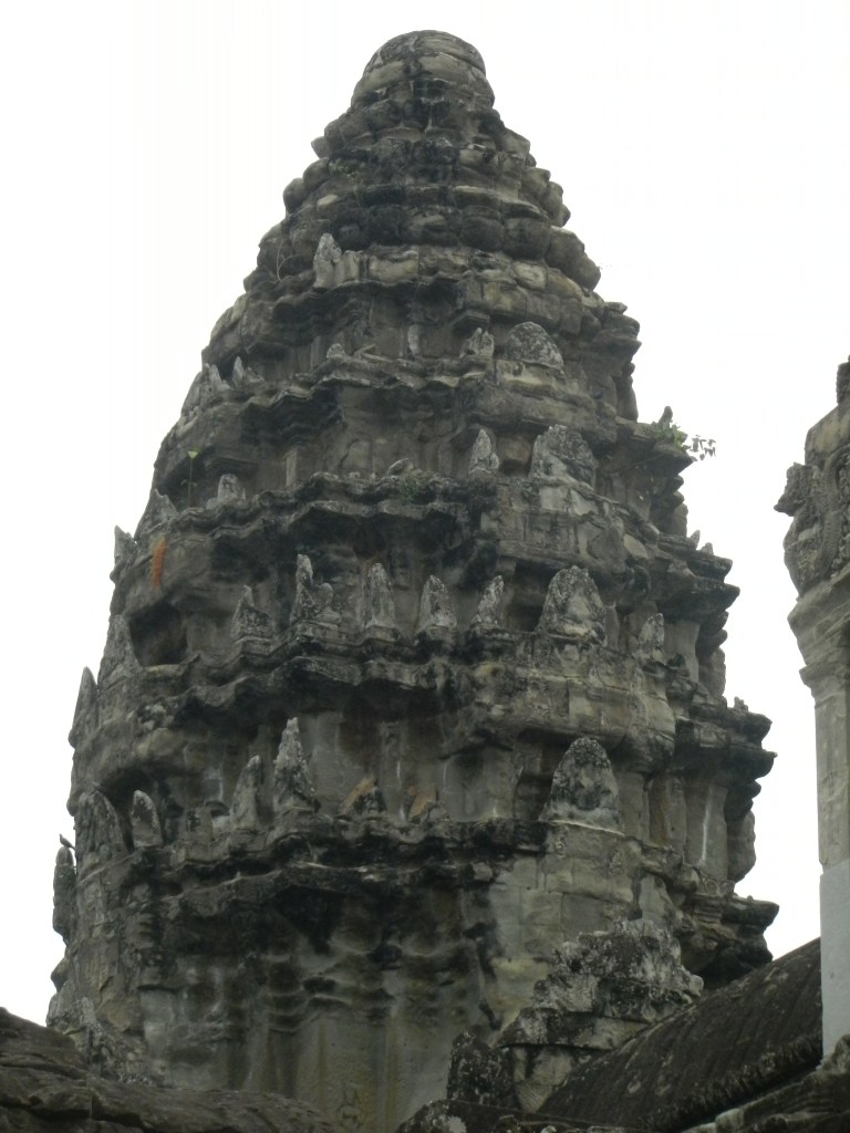 Top of main tower with eroded statues