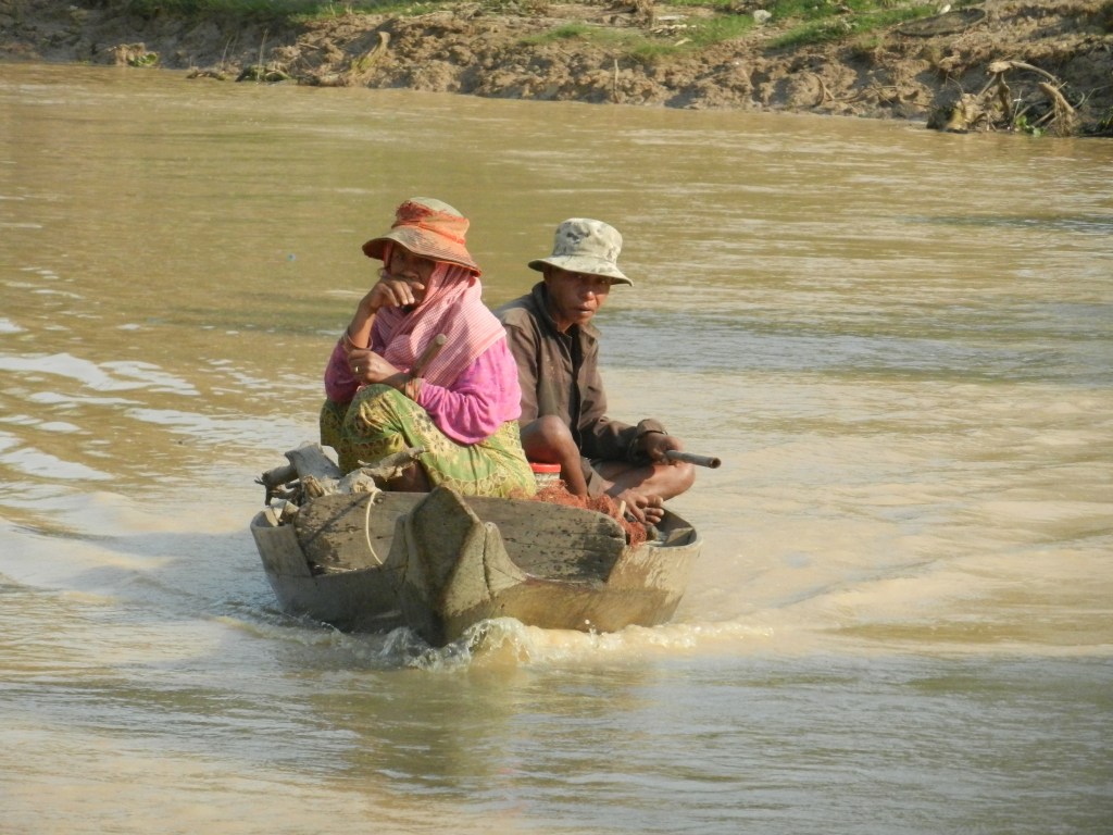 A couple on the canal leading to Tonle Sap