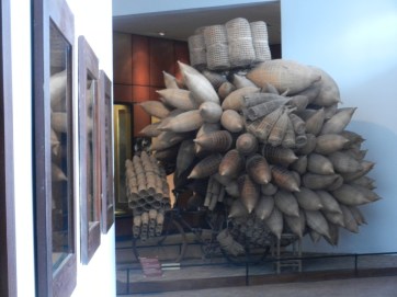 This display was created using a photograph of a man riding a bicycle loaded just as this model shows.