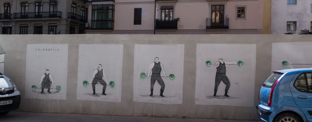 A more whimsical mural on a construction barrier