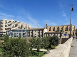 A medieval nunnery cheek by jowl with a modern highrise