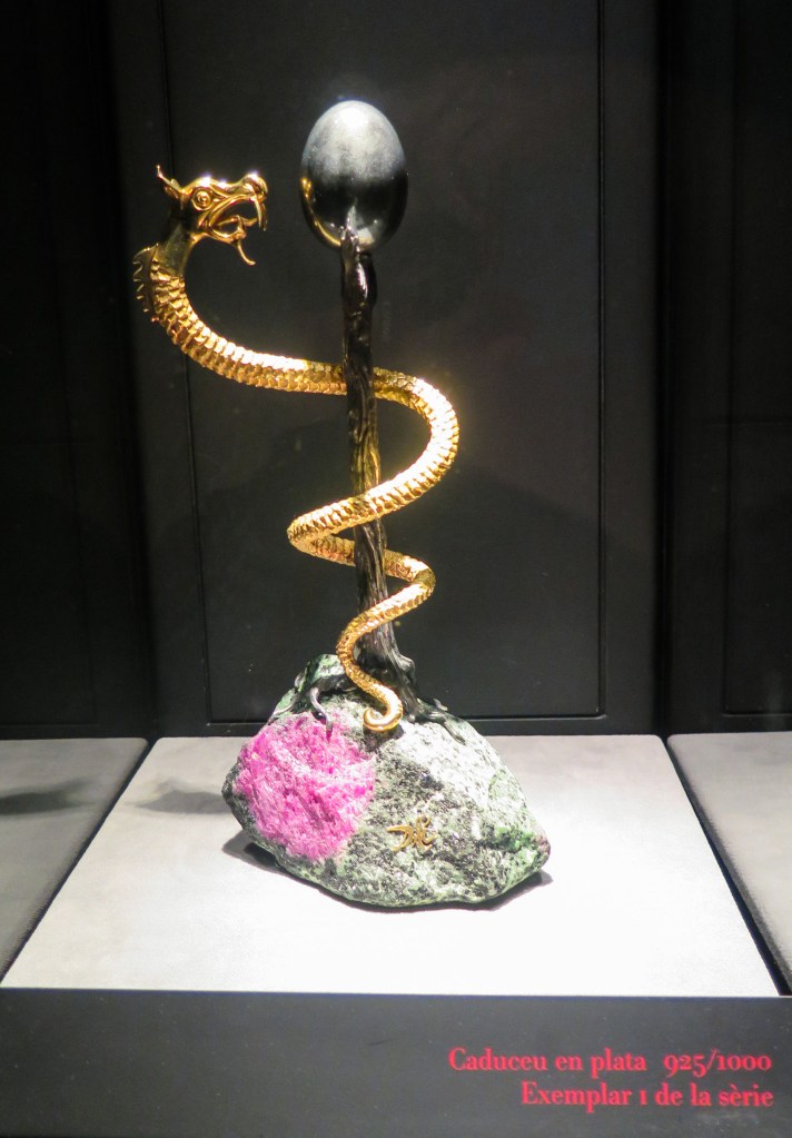 Snake and egg sculpture