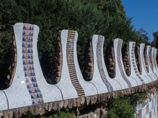 A pathway wall with ceramic decoration